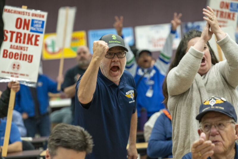 Union members cheer during a news conference following a vote count on the union contract at the IAM District 751 Main Union Hall in Seattle, Washington, US, on Thursday, Sept. 12, 2024. 