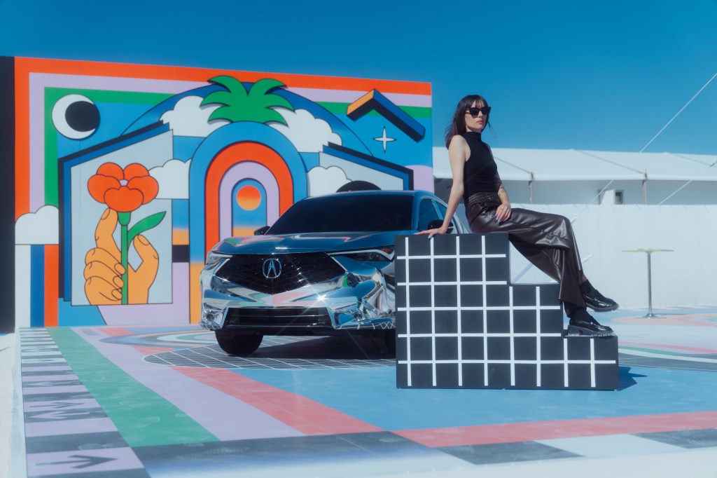 artist Dalkhafine in front of an Acura car