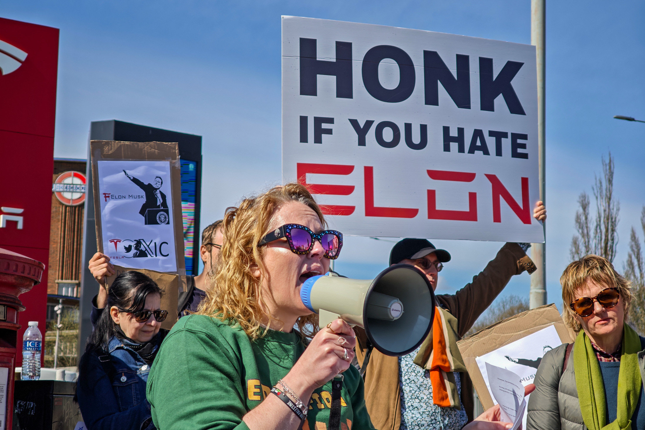 A protest on the side of a road in London.