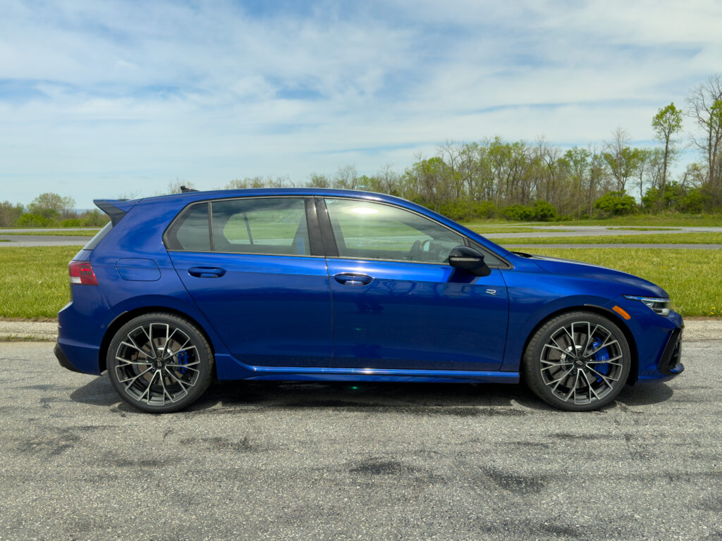 A blue VW Golf R seen from the side