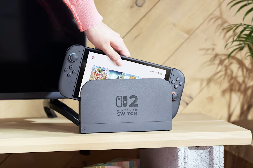 An image of someone removed the Nintendo Switch 2 from its dock.