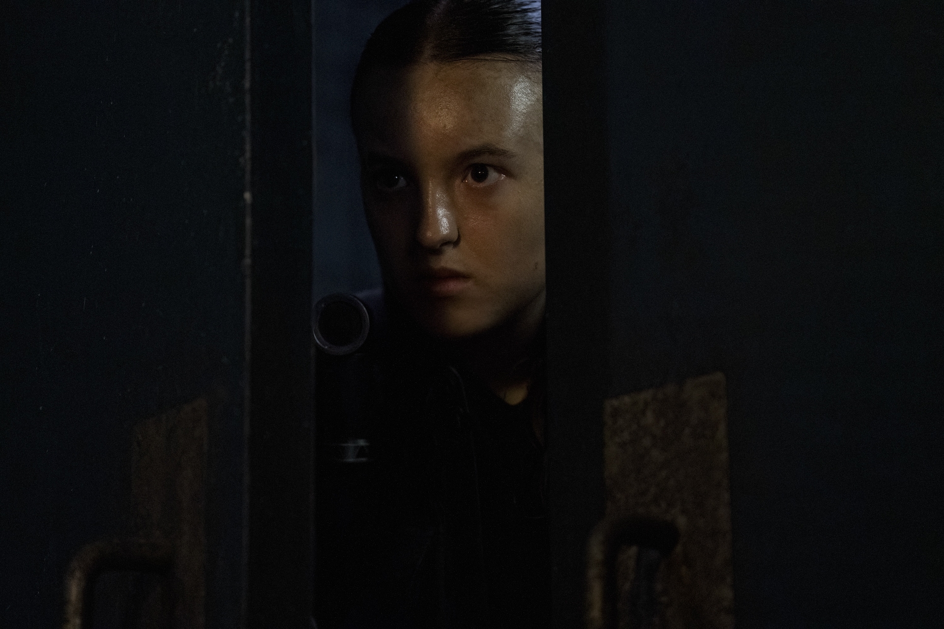 A still image of Bella Ramsey in the HBO series The Last of Us.
