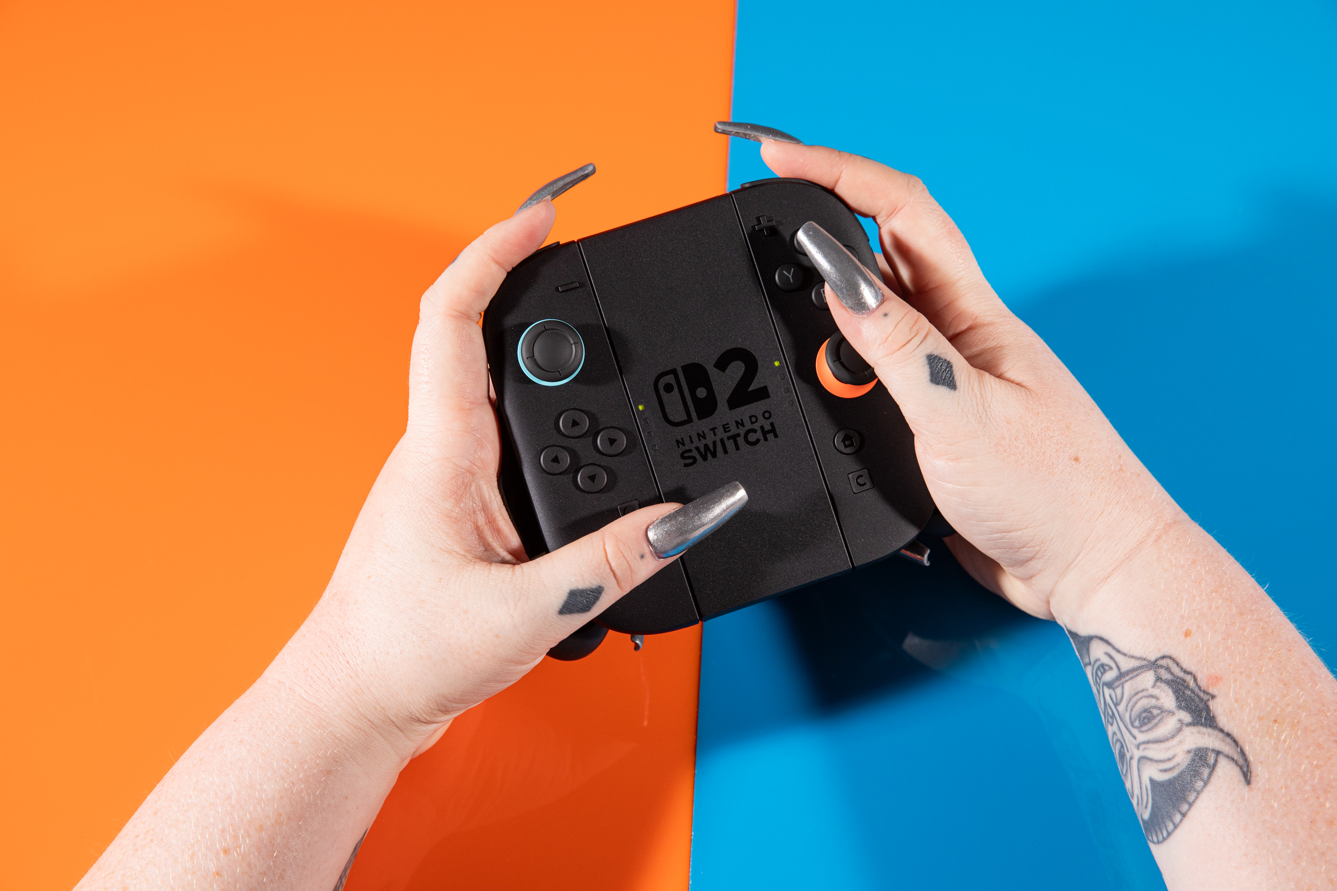 A photo of the NIntendo Switch 2’s Joy-Con controllers in their controller grip.