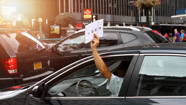 New Yorkers groan at backseat ads, but Uber is betting on its data and design to flip perception.