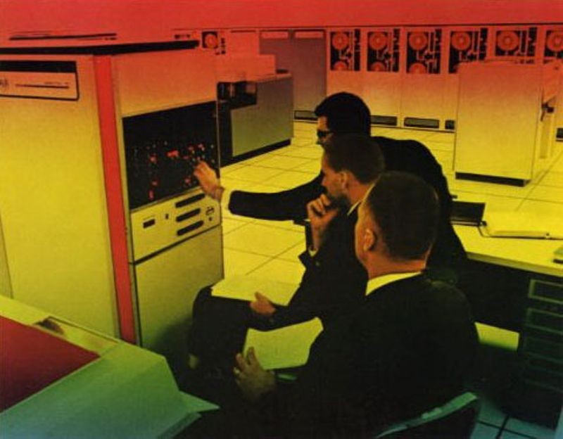 A view of operators using an RCA Spectra 70 control panel similar to the one found in the garage, circa 1965.