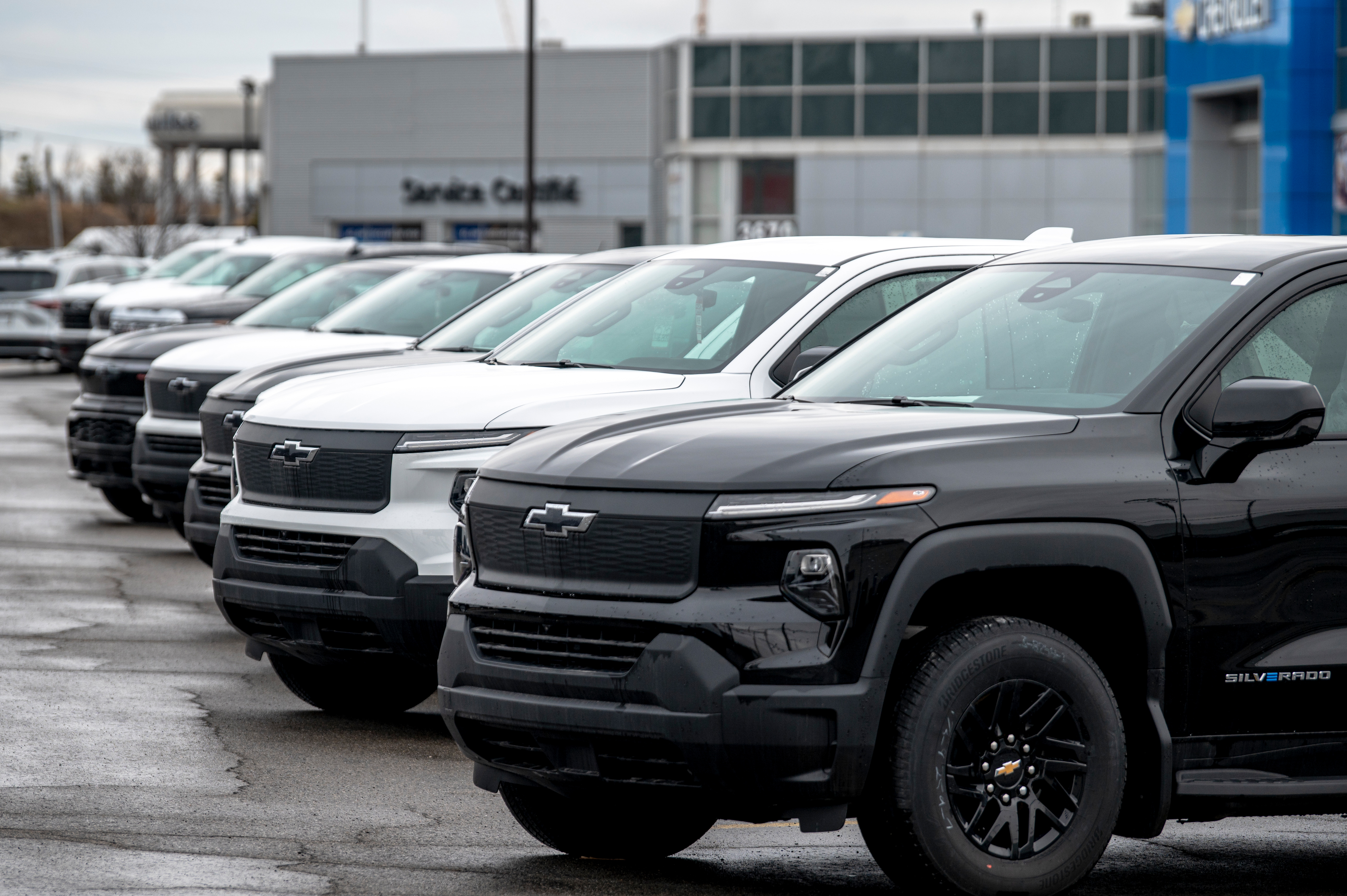 Chevrolet Silverado electric pickup trucks at a GMC Chevrolet dealership in Laval, Quebec, Canada, on Thursday, April 3rd, 2025.