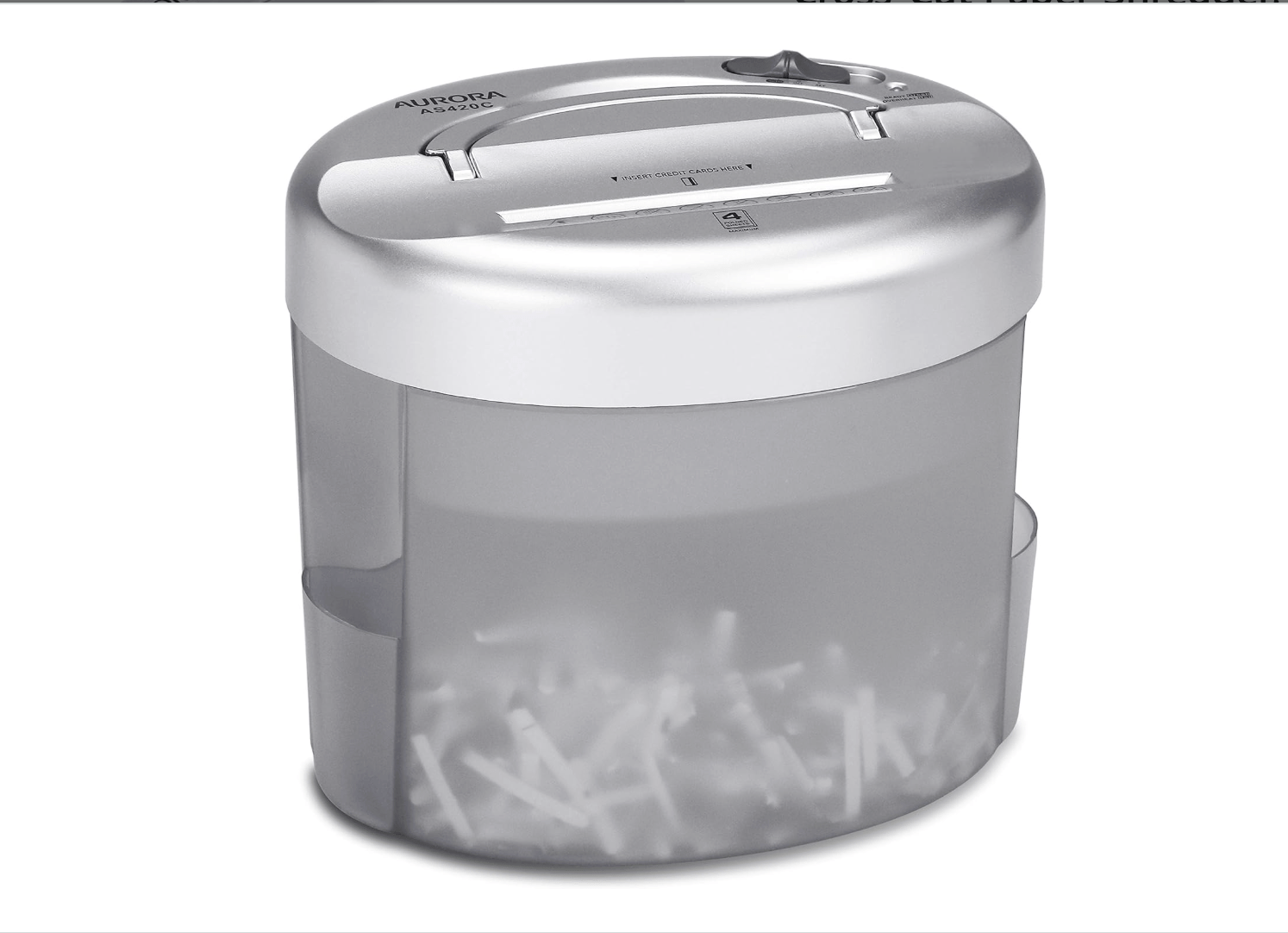 A shredder with some shredded paper visible in the bin.