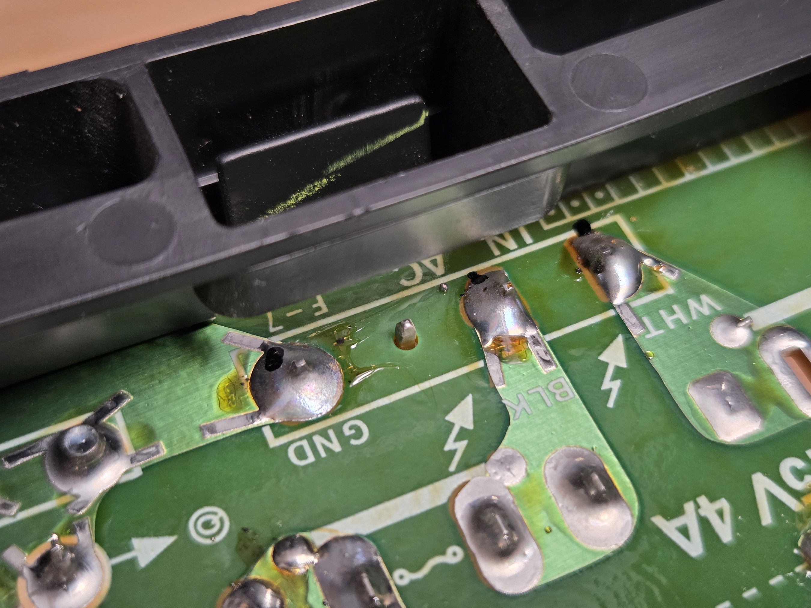 “From what I can see, there are signs of a cracked or weakened solder joint,“ FixBot wrote when I presented this photo. A CRT expert tells me these joints are fine.