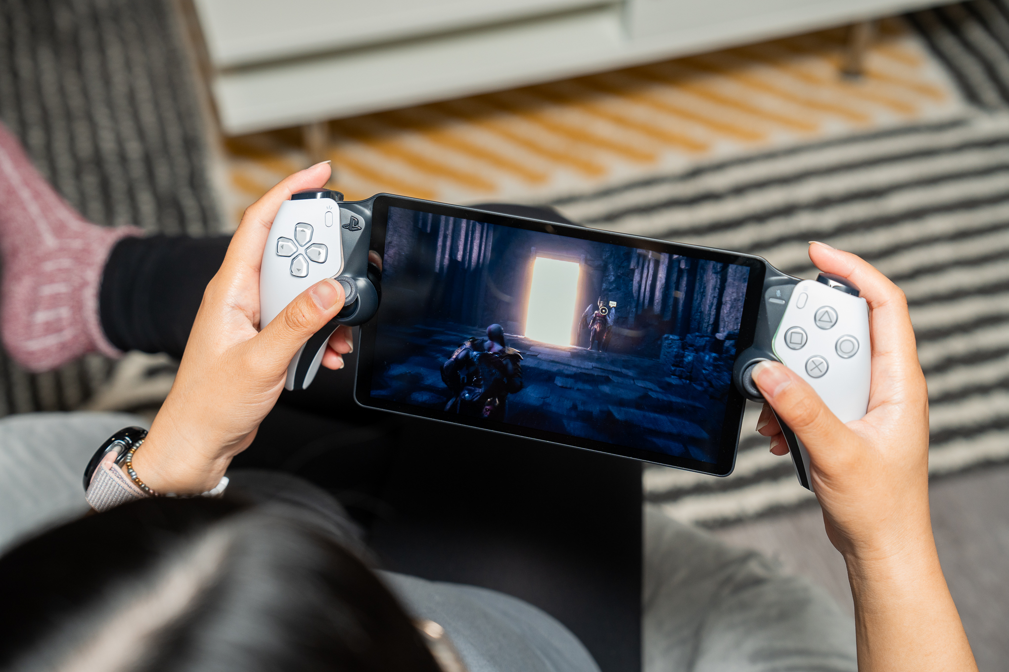 A picture of somebody holding the PlayStation Portal