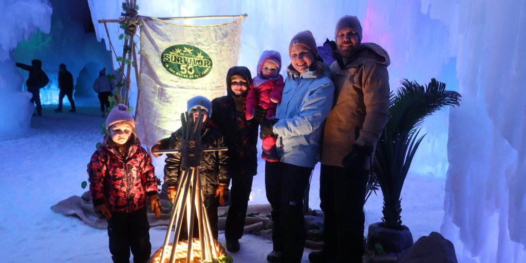 Image of a family of Survivors fans at an indoor ice activation.