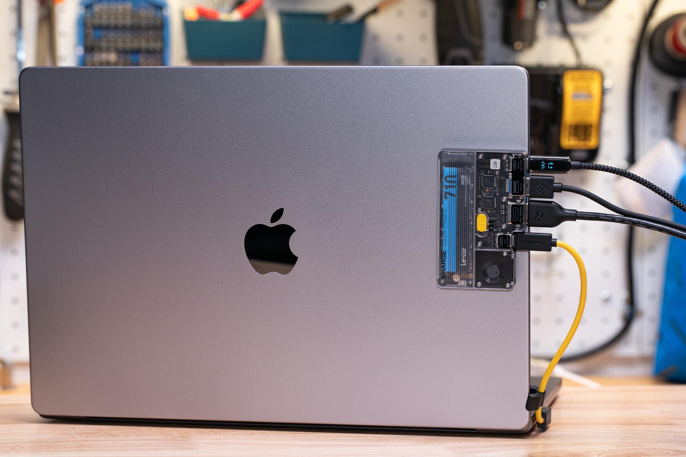 I stuck a magnetic ring to my MacBook so I could hang the Disk Pro 2 on the back of its lid.
