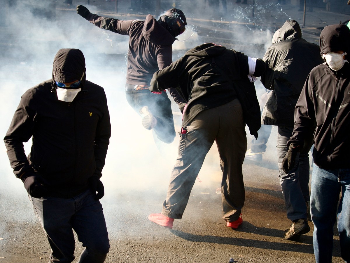 Protesters and police during demonstrations in Paris, October 2026